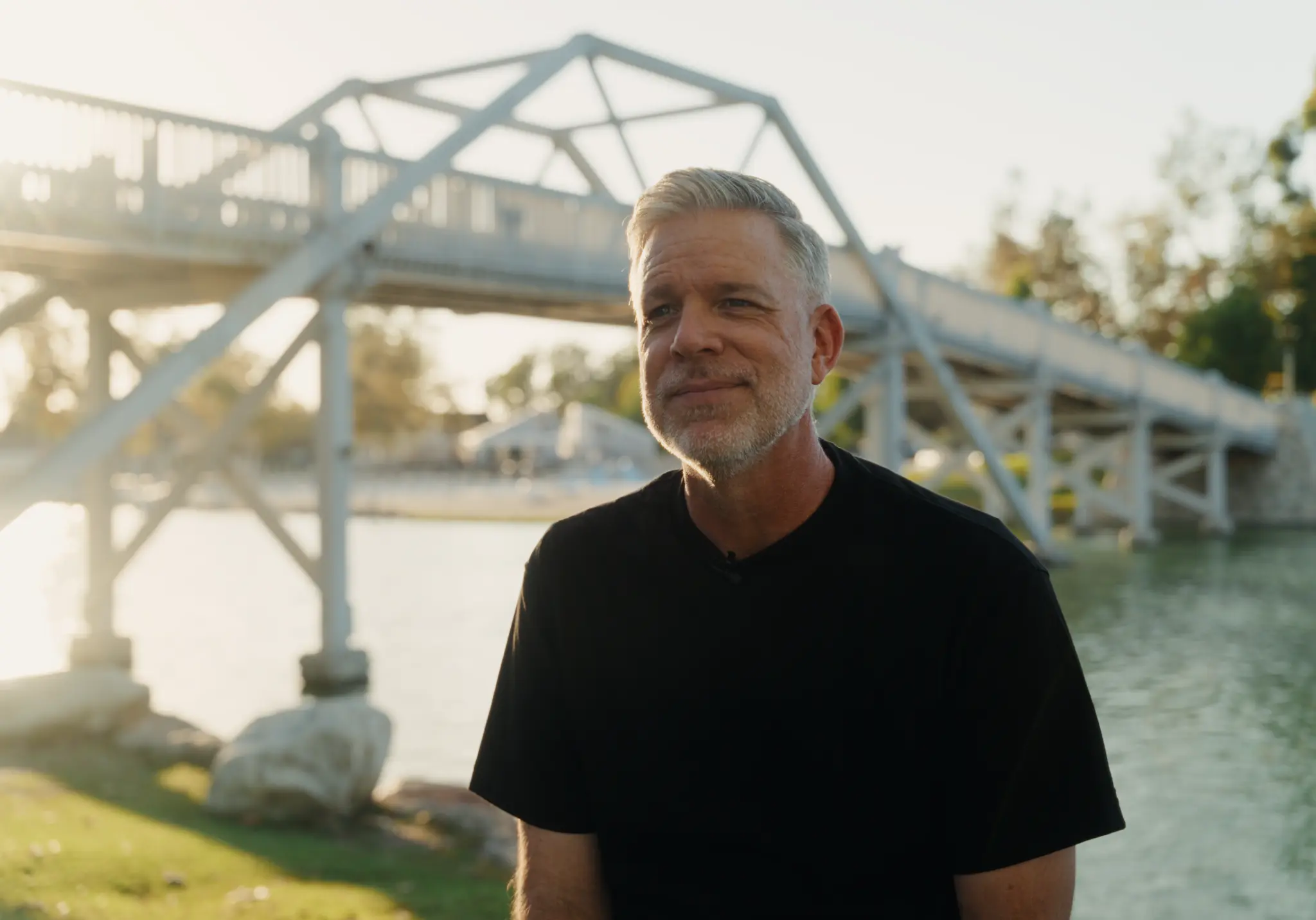 Chad sharing his testimony beside the water.
