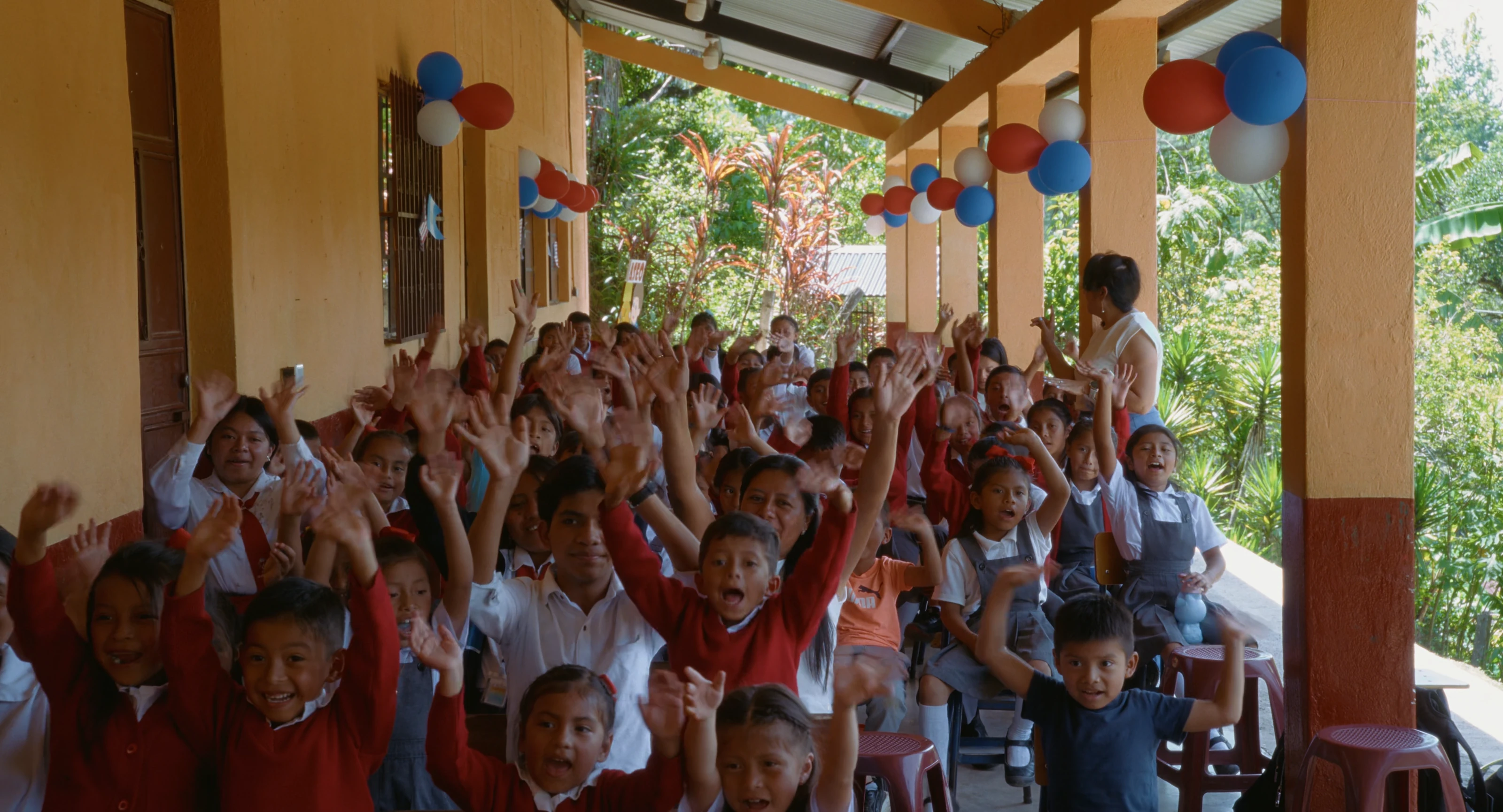 Students celebrating together at a school gathering in Guatemala.